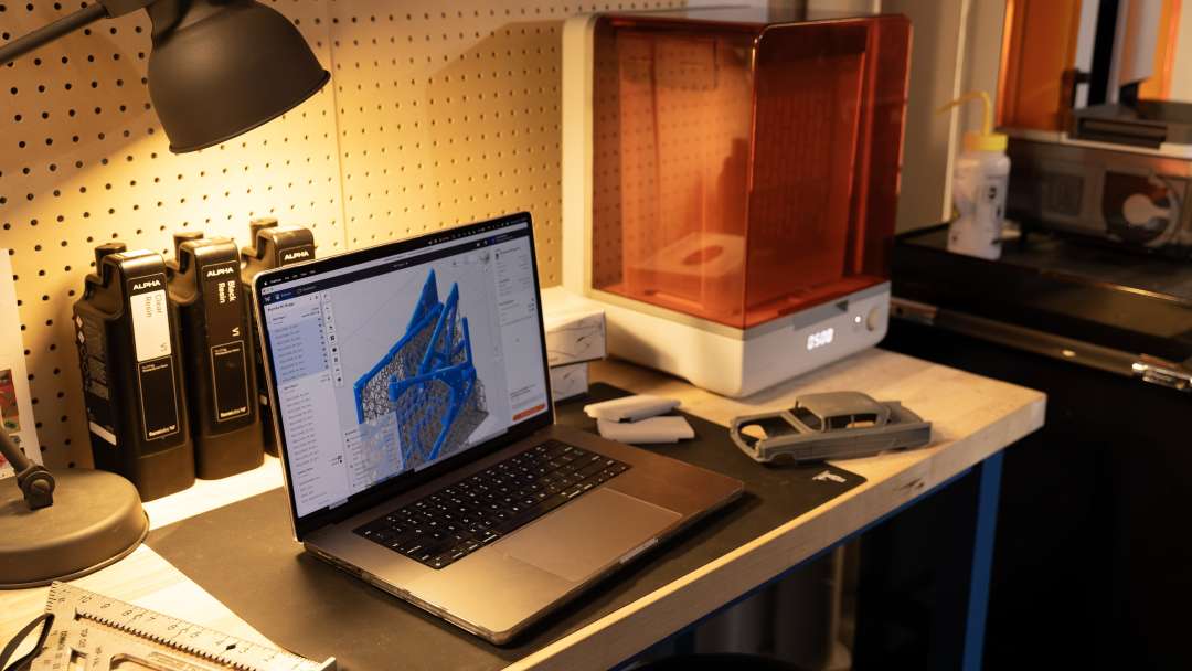 Formlabs Form Studio 1 Flex Graphite with resin cartridges and a printed car model